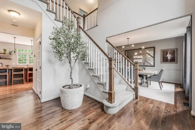 a view of a living room and entryway