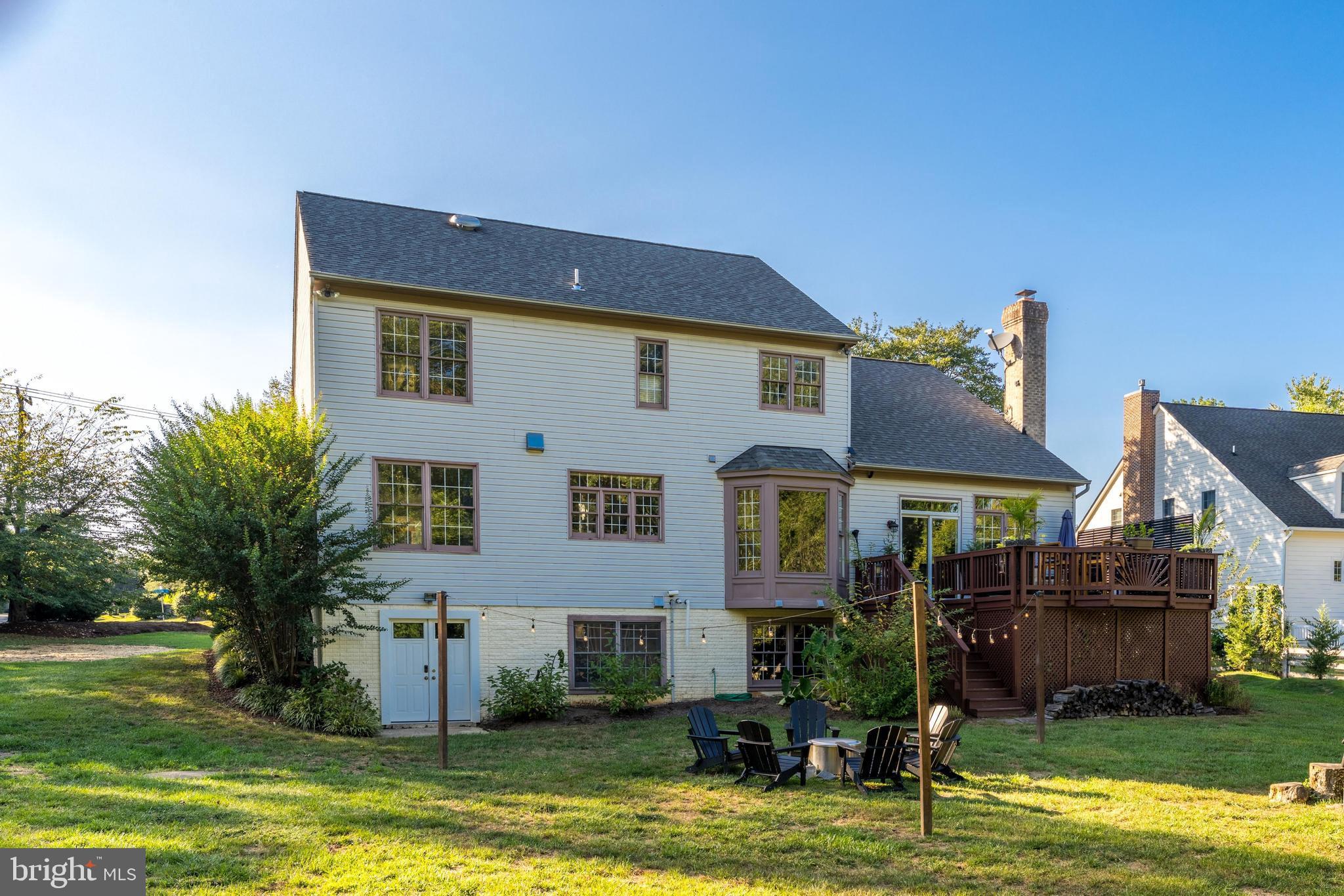 1179 Reston Avenue Herndon, VA 20194 - Photo 42 of 47 a front view of a house with a garden and swimming pool