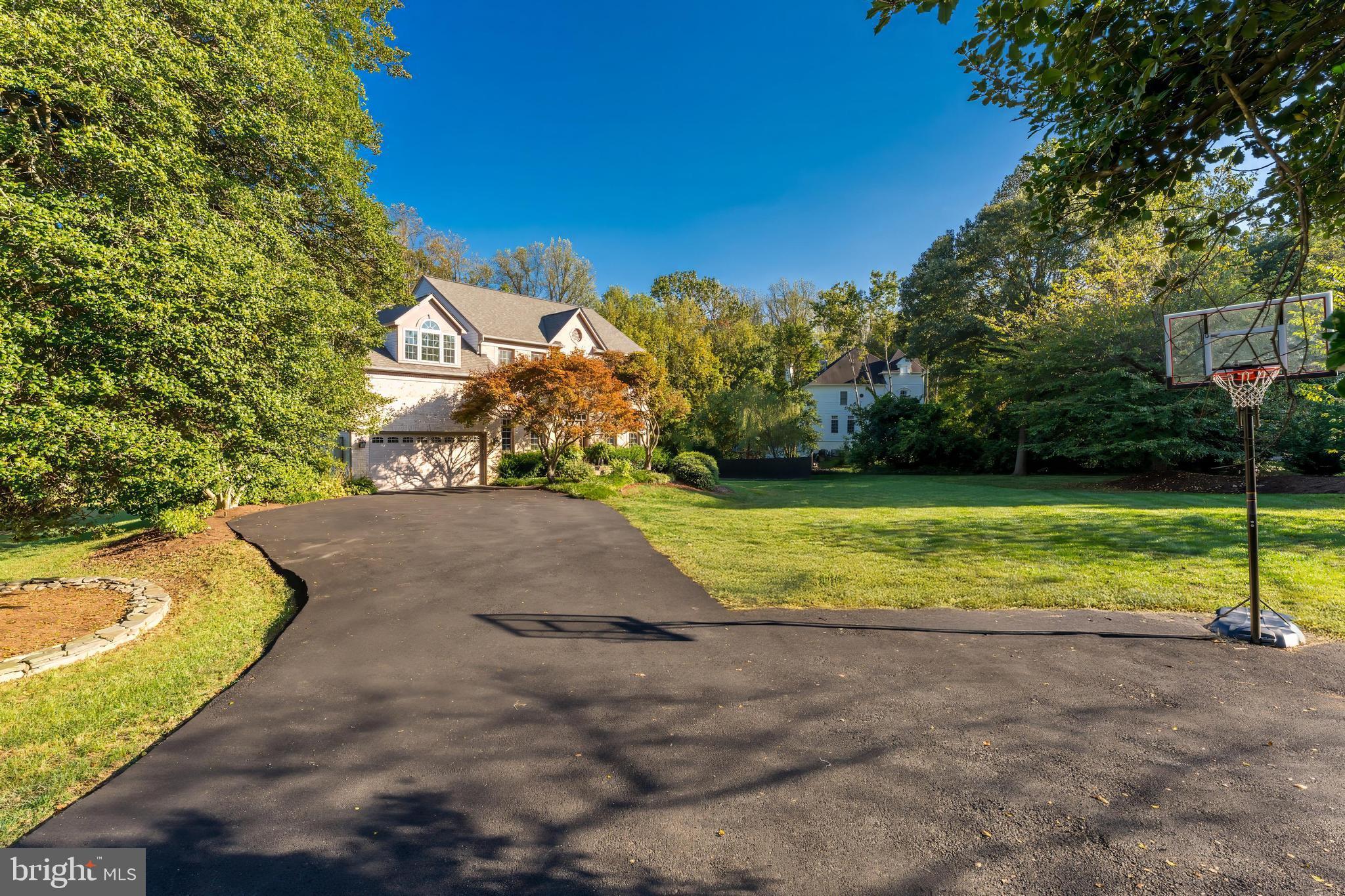 1179 Reston Avenue Herndon, VA 20194 - Photo 47 of 47 a view of a house with a yard