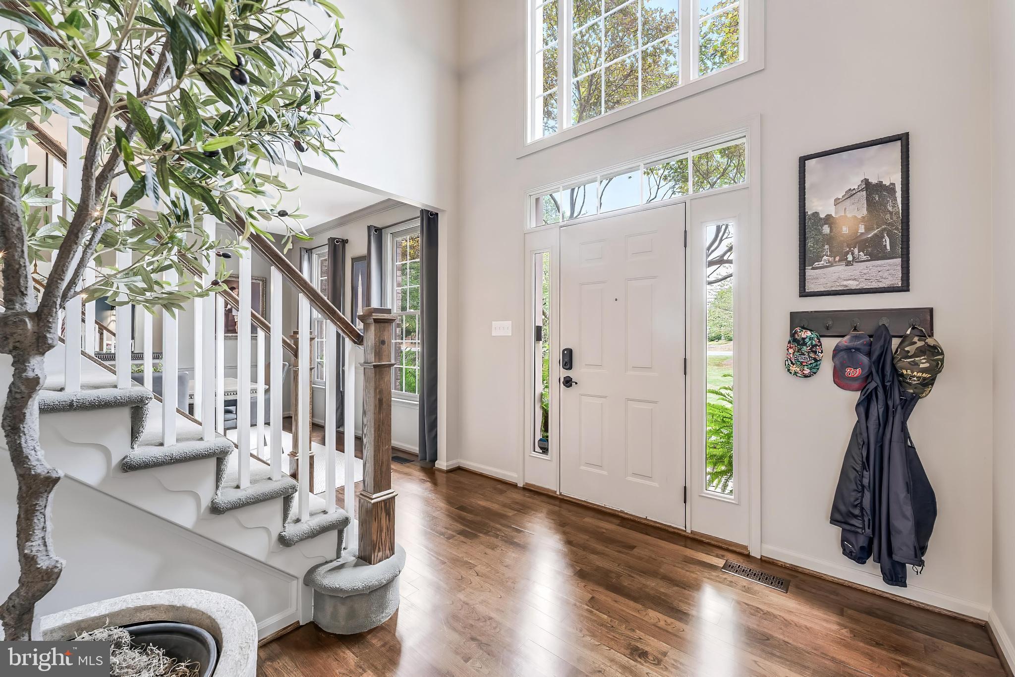 1179 Reston Avenue Herndon, VA 20194 - Photo 5 of 47 a view of entryway and hall with wooden floor