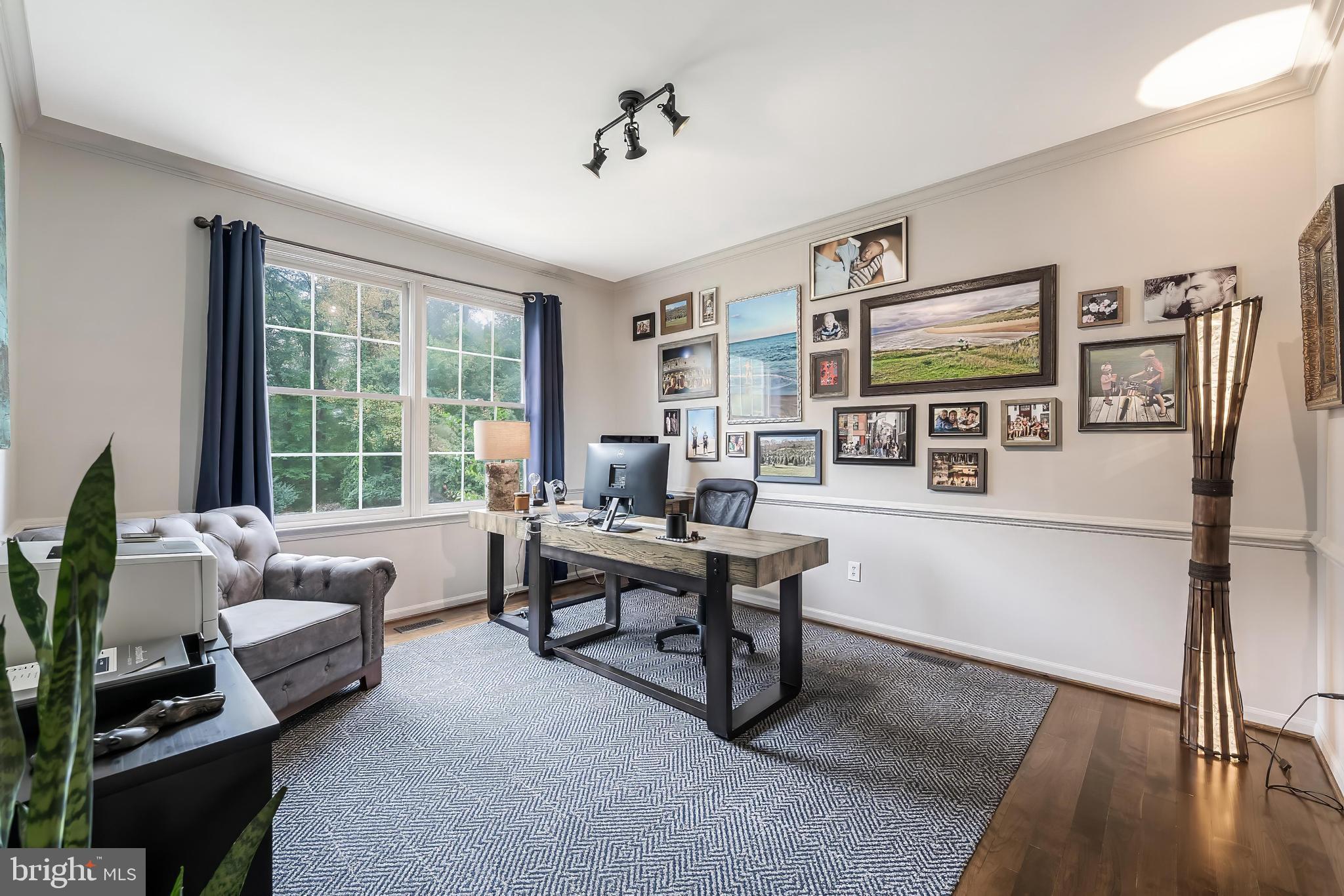 1179 Reston Avenue Herndon, VA 20194 - Photo 10 of 47 a living room with furniture and a window