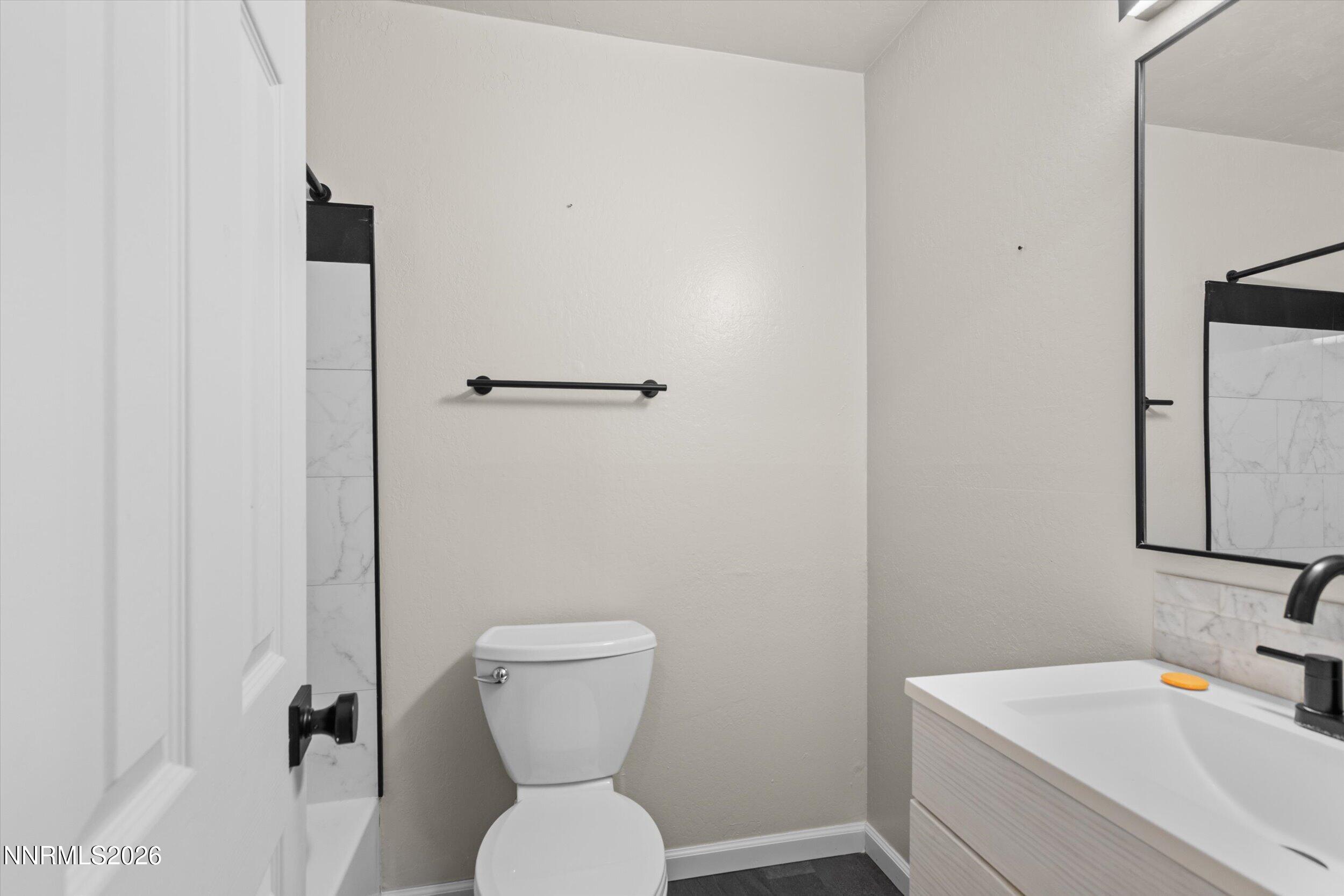 2300 Dickerson Road, Unit 51 Reno, NV 89503 - Photo 21 of 46 a bathroom with a sink toilet and shower