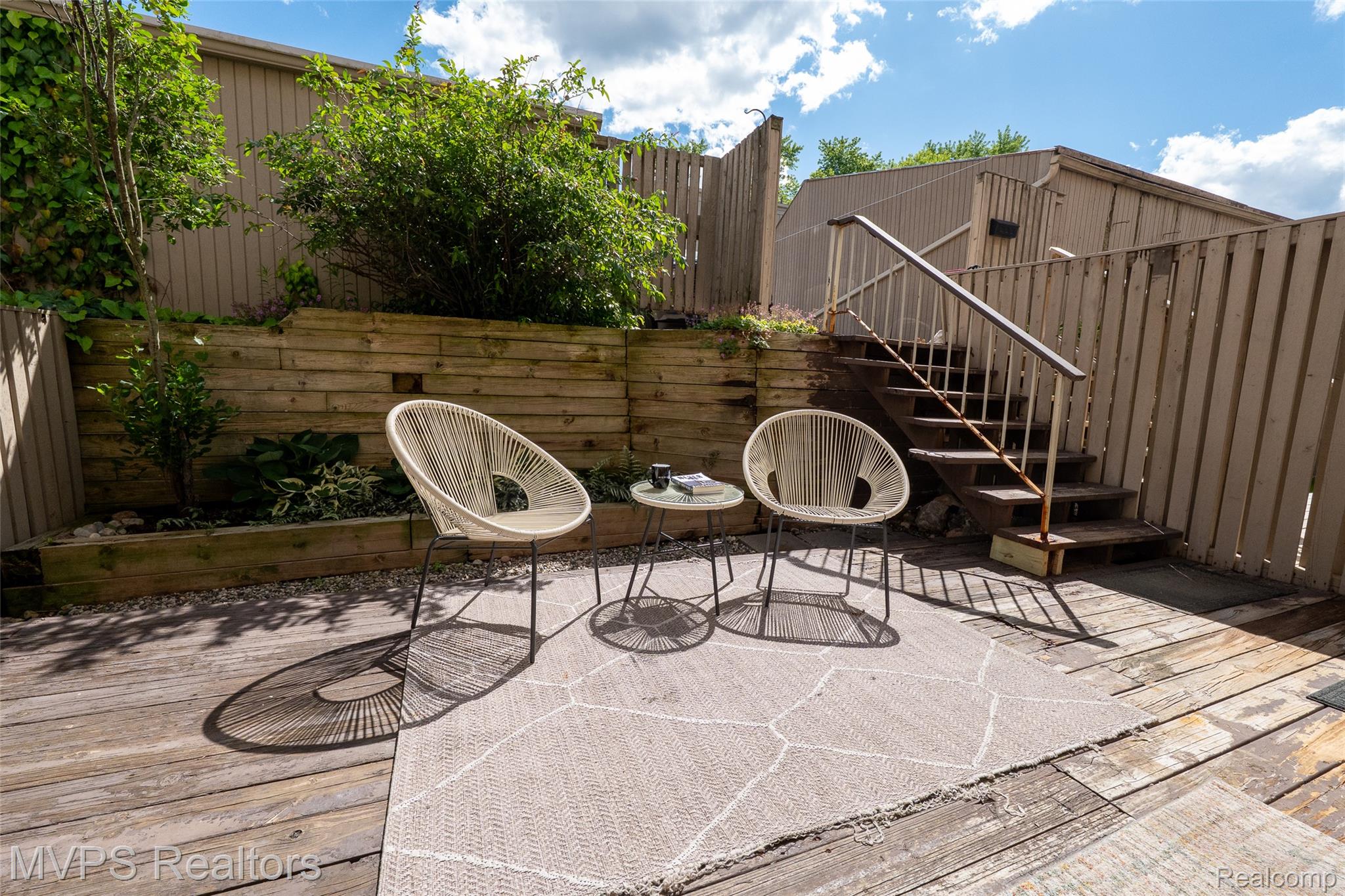 804 Oak Brook Ridge Drive, Unit 149 Rochester, MI 48307 - Photo 40 of 49 patiowithchairs.jpg