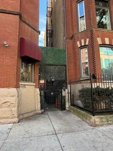 a view of a car park in front of a building