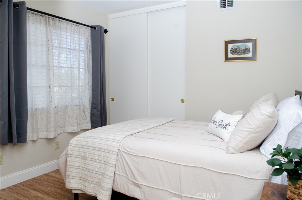 27625 Moonlight Place Castaic, CA 91384 - Photo 22 of 72 a bedroom with a bed and a window