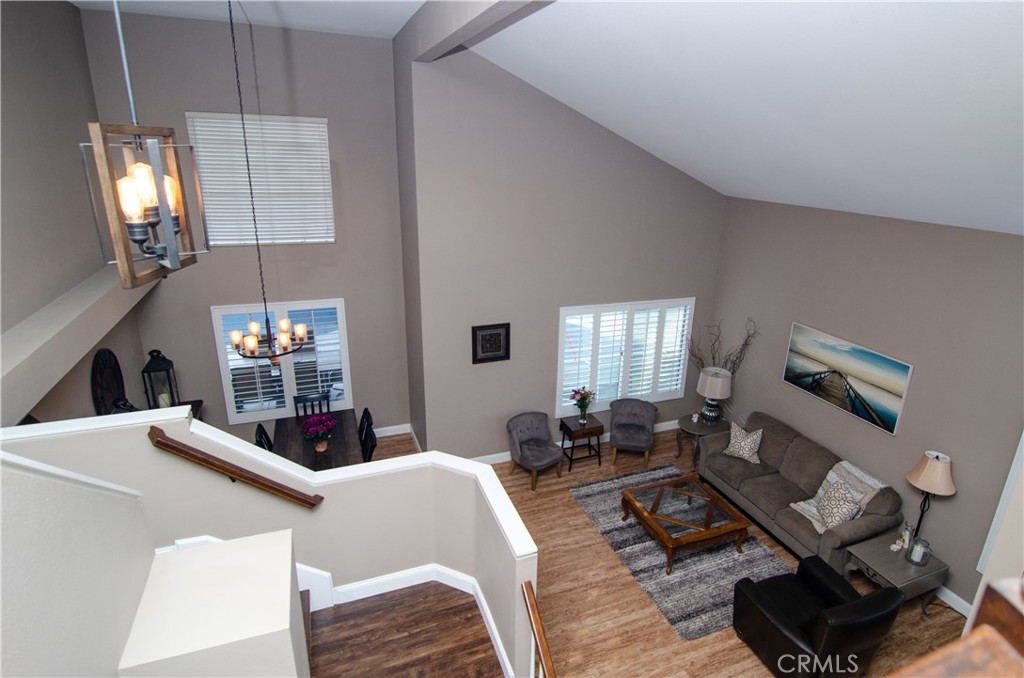 27625 Moonlight Place Castaic, CA 91384 - Photo 27 of 72 a living room with furniture and a flat screen tv