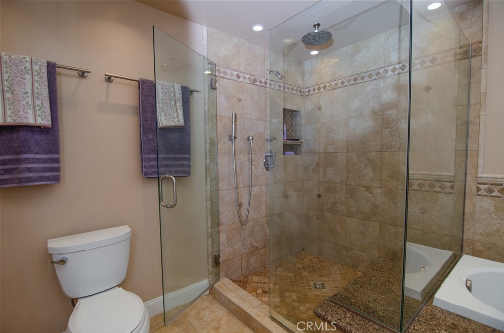 27625 Moonlight Place Castaic, CA 91384 - Photo 38 of 72 a bathroom with a shower a toilet and a sink