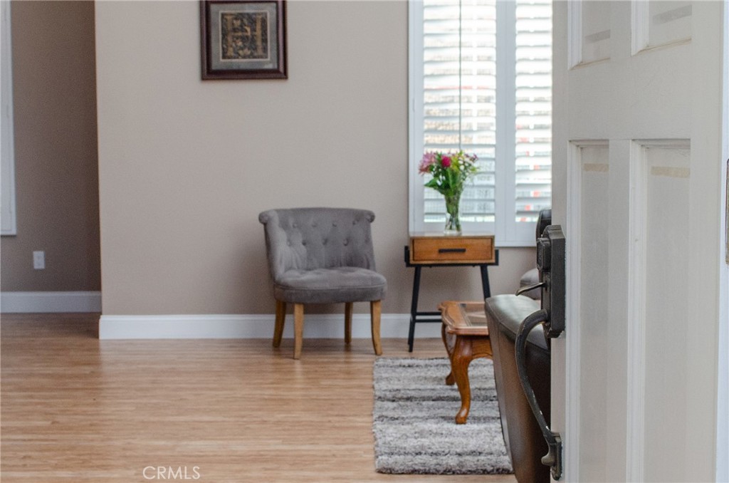 27625 Moonlight Place Castaic, CA 91384 - Photo 7 of 72 a view of a livingroom with furniture and a window