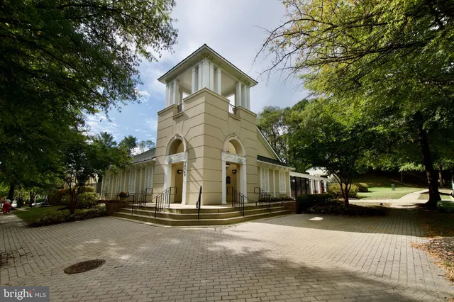 a view of a street with cars