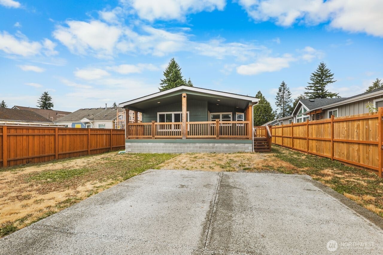120 L Street Southeast Auburn, WA 98002 - Photo 17 of 20 a view of a house with a yard