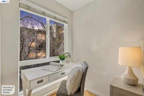 a room with furniture and a large window