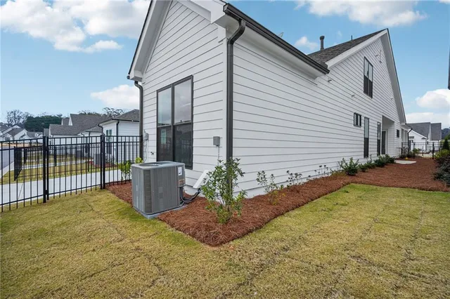 a view of a backyard with sitting area