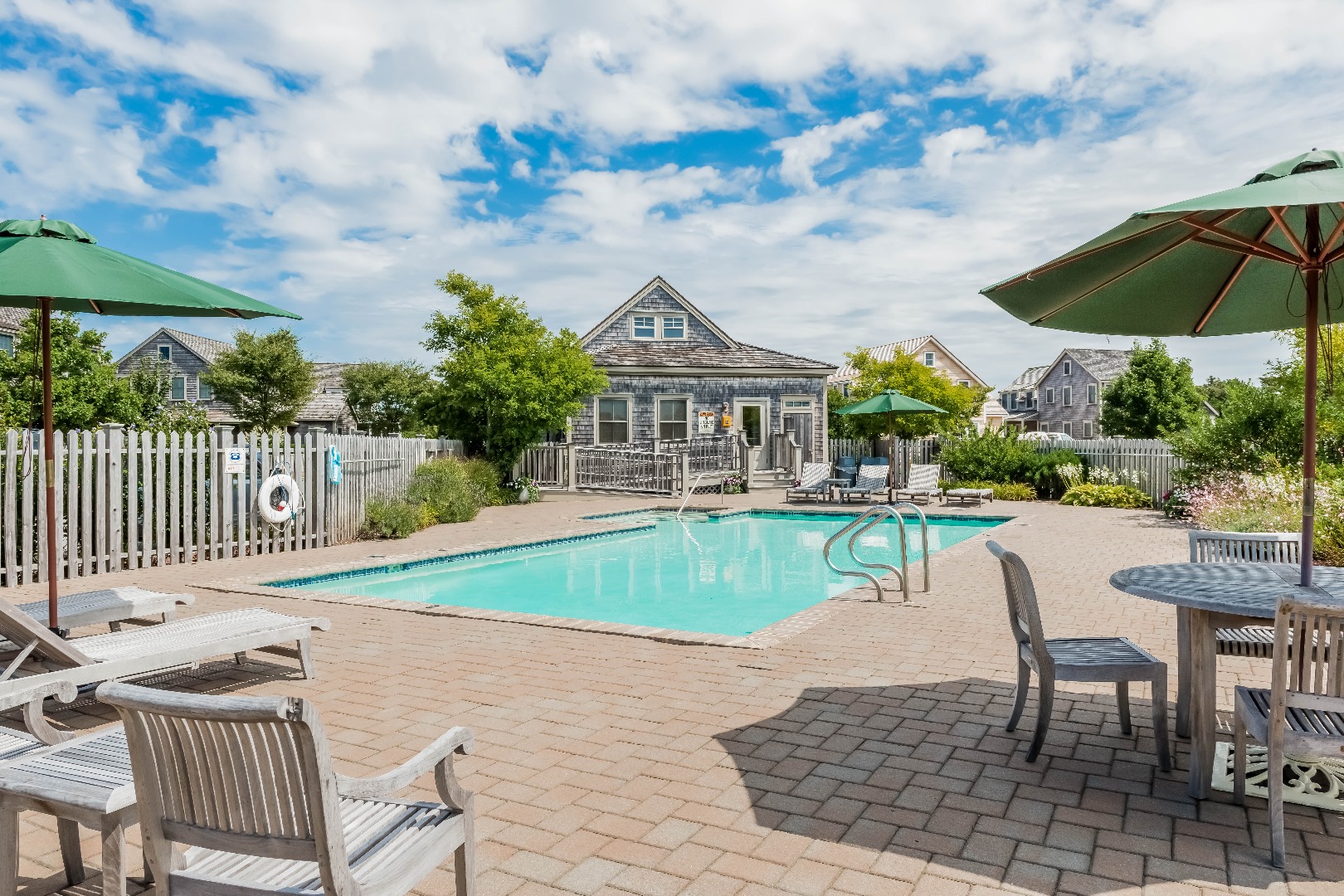 16 Blazing Star Road Nantucket, MA 02554 - Photo 28 of 35 a view of a house with backyard and sitting area