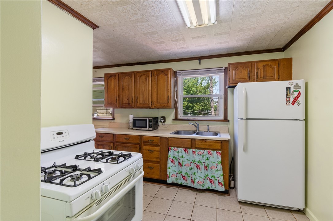 206 English Road Greece, NY 14616 - Photo 9 of 24 Easy to work in kitchen! Just the right size!