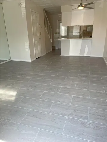 a view of a kitchen with a sink