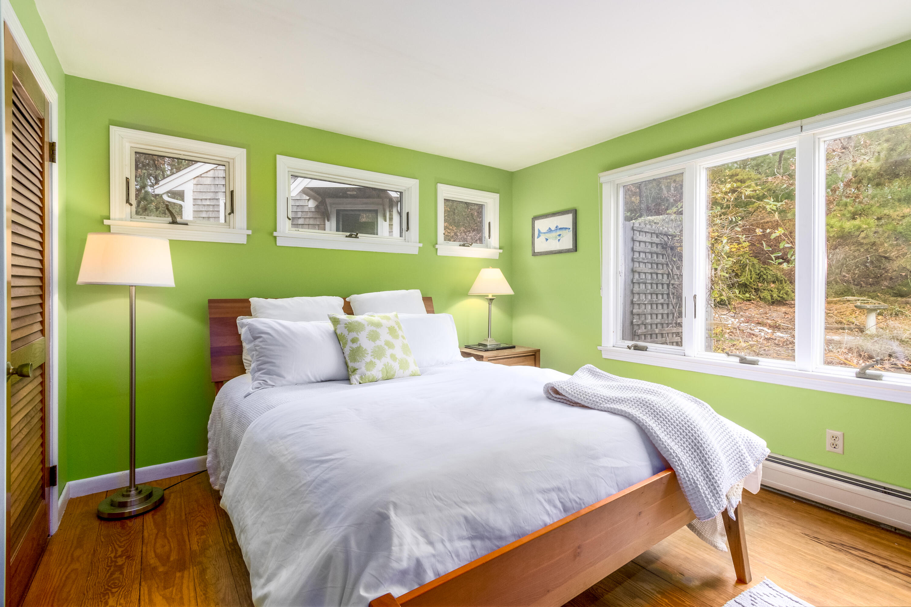 3 Tern Road Harwich, MA 02645 - Photo 20 of 44 a bed sitting in a bedroom next to a window