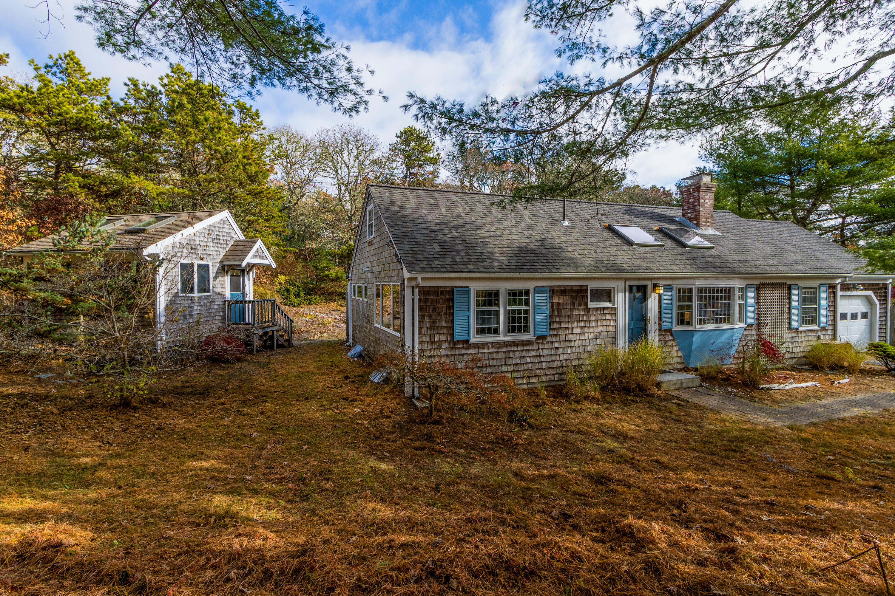 3 Tern Road Harwich, MA 02645 - Photo 2 of 44 a front view of a house with a yard