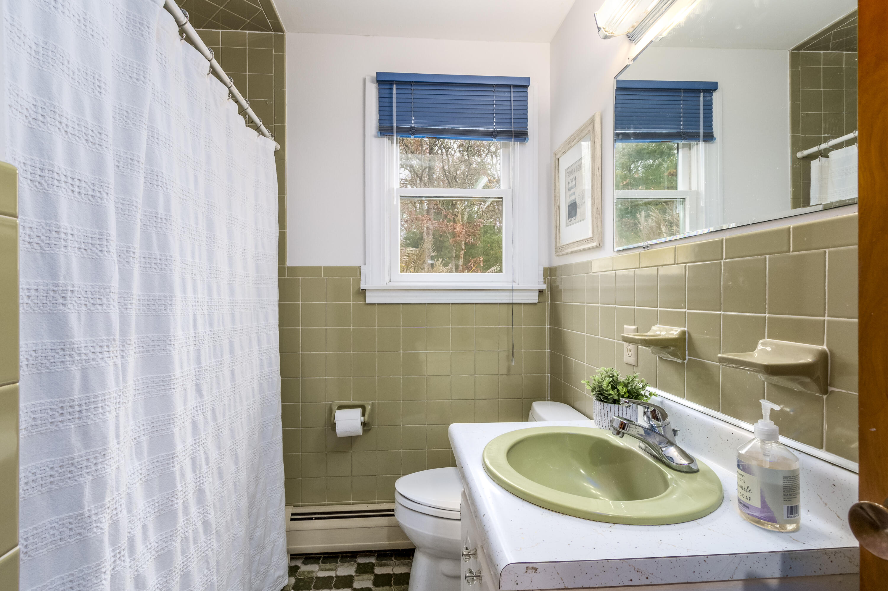 3 Tern Road Harwich, MA 02645 - Photo 22 of 44 a bathroom with a sink toilet and shower