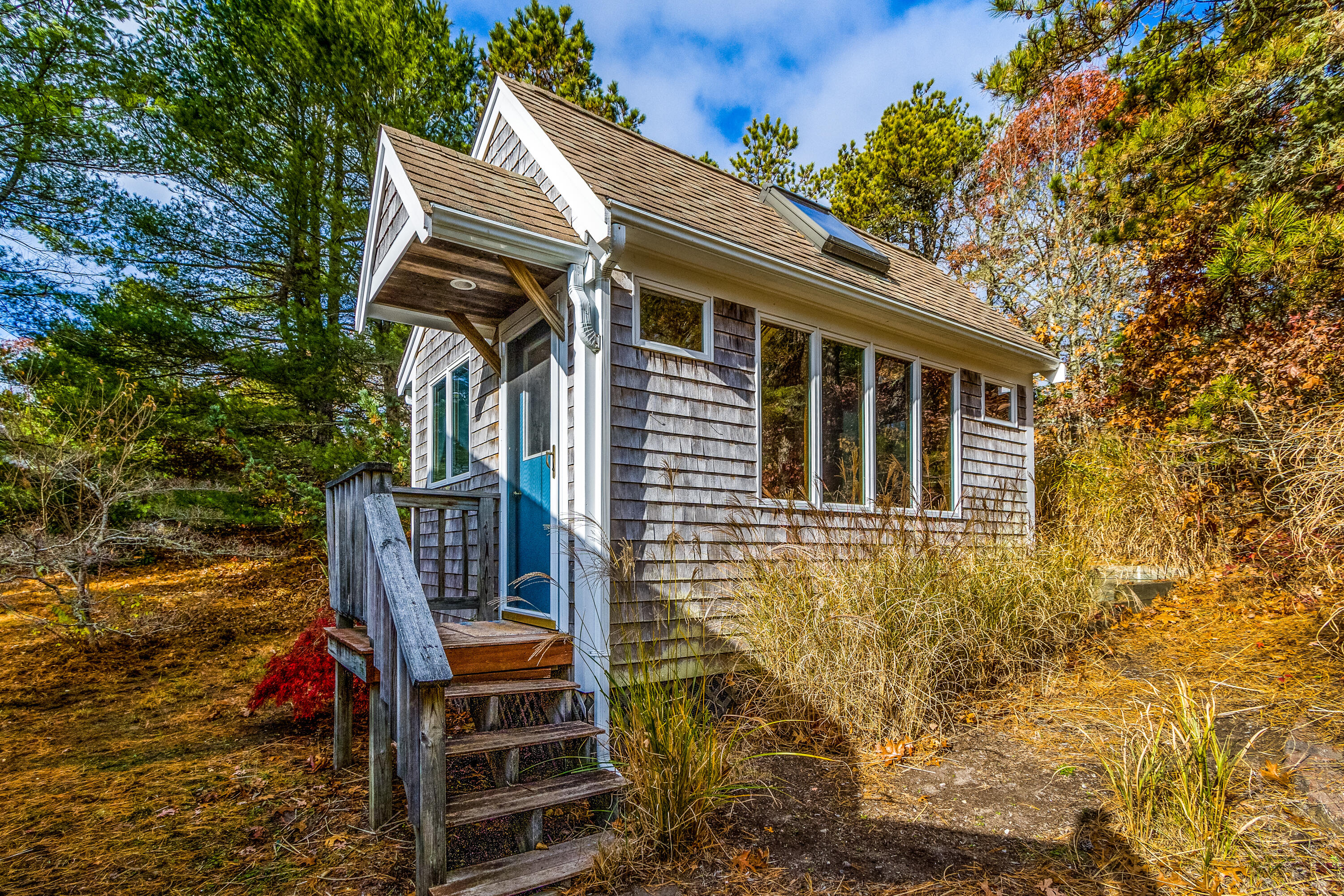 3 Tern Road Harwich, MA 02645 - Photo 28 of 44 a front view of a house with a garden