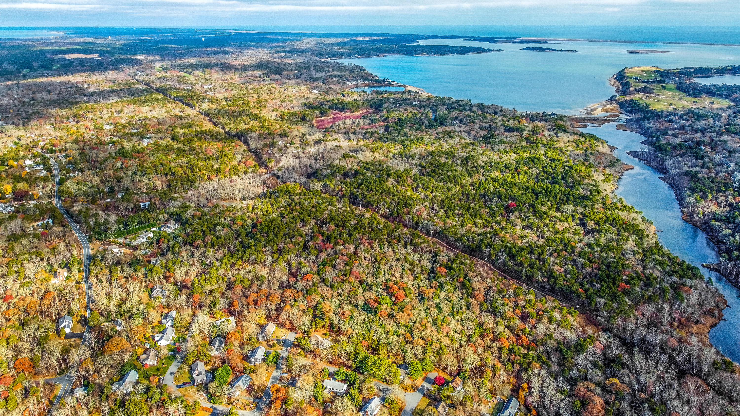 3 Tern Road Harwich, MA 02645 - Photo 38 of 44 a view of a lake with beach and ocean