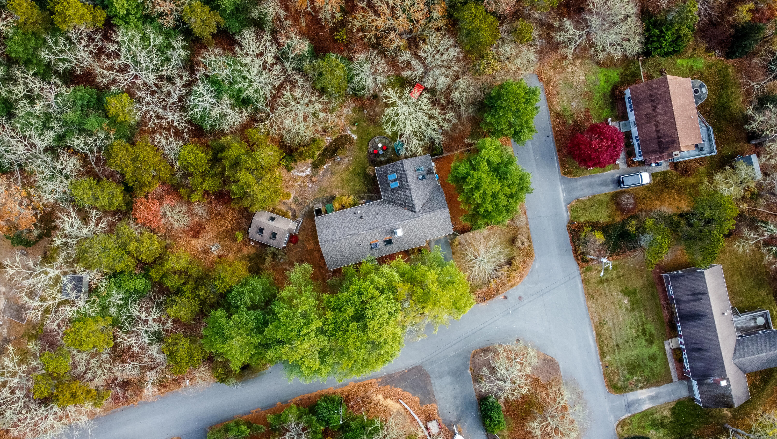 3 Tern Road Harwich, MA 02645 - Photo 4 of 44 an aerial view of a house with a yard basket ball court and outdoor seating