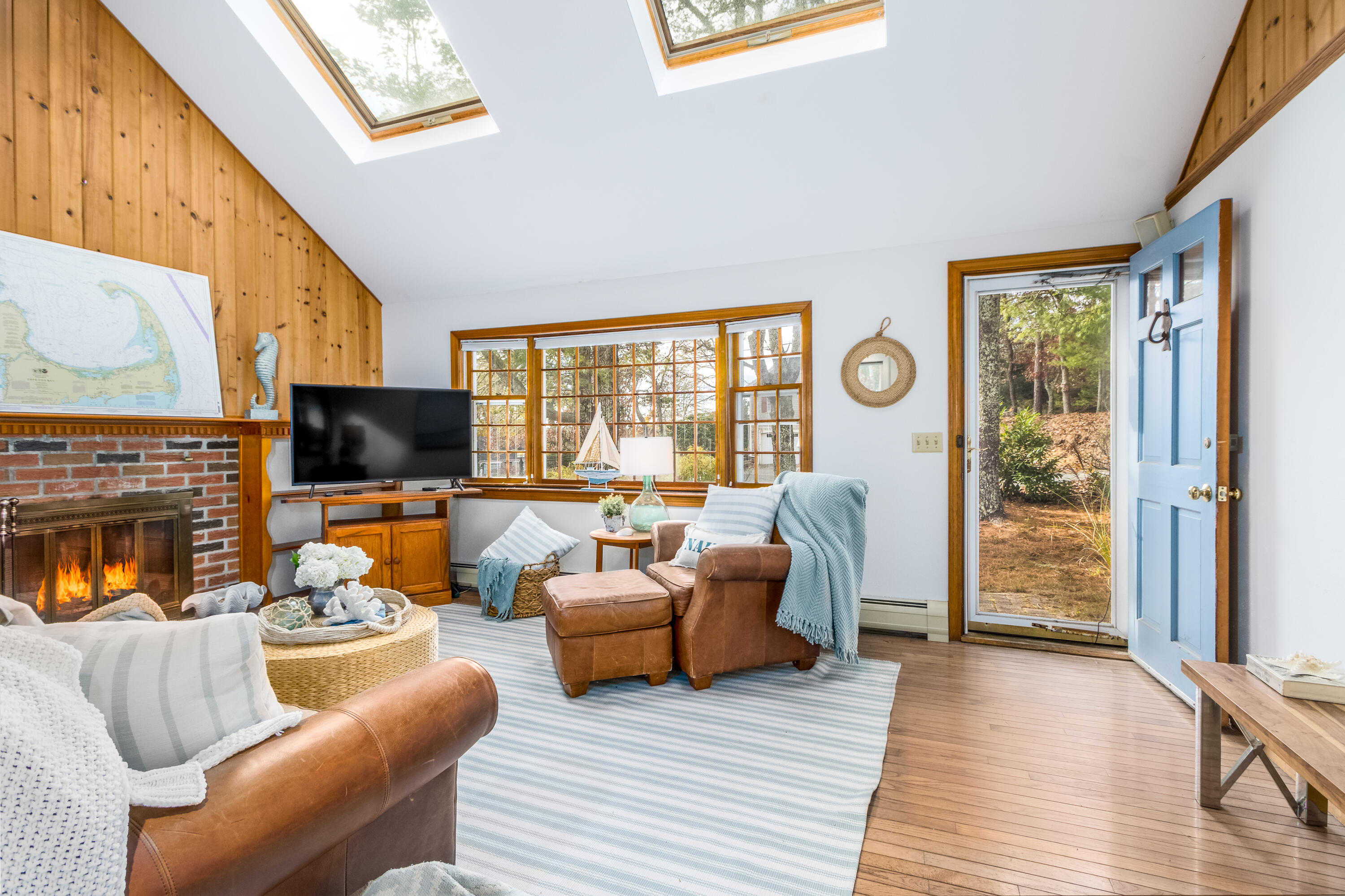 3 Tern Road Harwich, MA 02645 - Photo 5 of 44 a living room with furniture fireplace and a flat screen tv