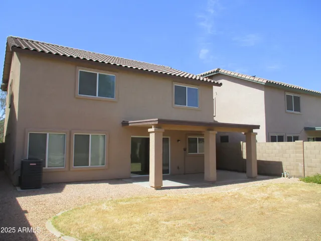 a view of a swimming pool with an outdoor space