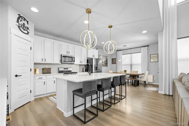 $769,999 | 2102 Bouquet Drive, Windsor, CO 80550