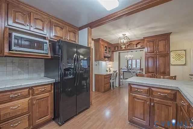 a bathroom with a double vanity sink mirror and shower