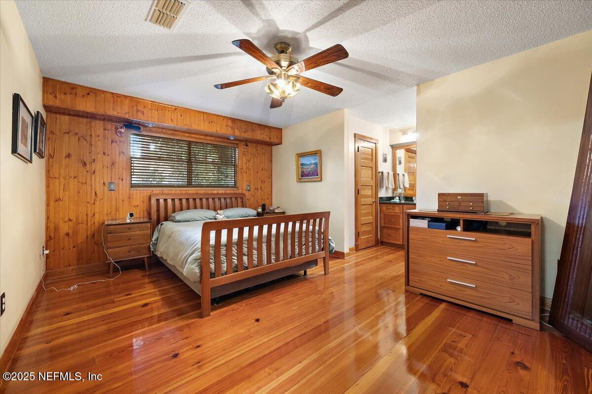 10567 Scott Mill Road Jacksonville, FL 32257 - Photo 11 of 28 a bedroom with a bed and window