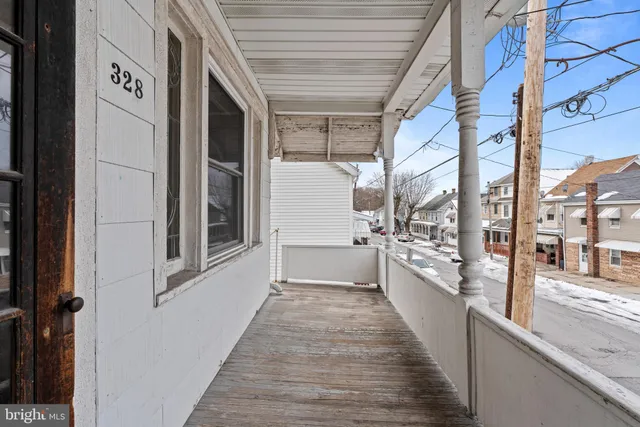 a view of a bathroom with a sink and windows