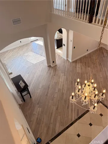 a view of a kitchen from the hallway