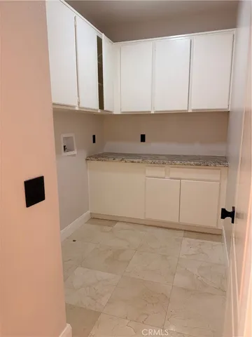 a view of street with tall buildings