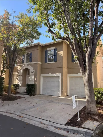 a view of a patio with table and chairs and potted plants