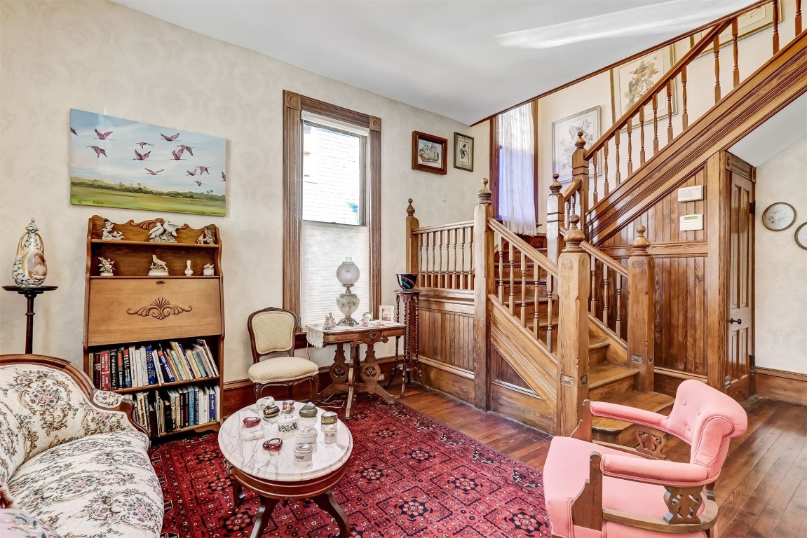 22 North 4th Street Fernandina Beach, FL 32034 - Photo 13 of 100 a living room with furniture a rug and a painting on the wall