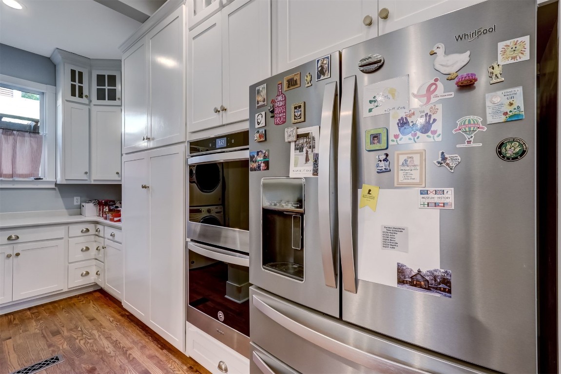 22 North 4th Street Fernandina Beach, FL 32034 - Photo 21 of 100 a kitchen with stainless steel appliances a refrigerator and cabinets