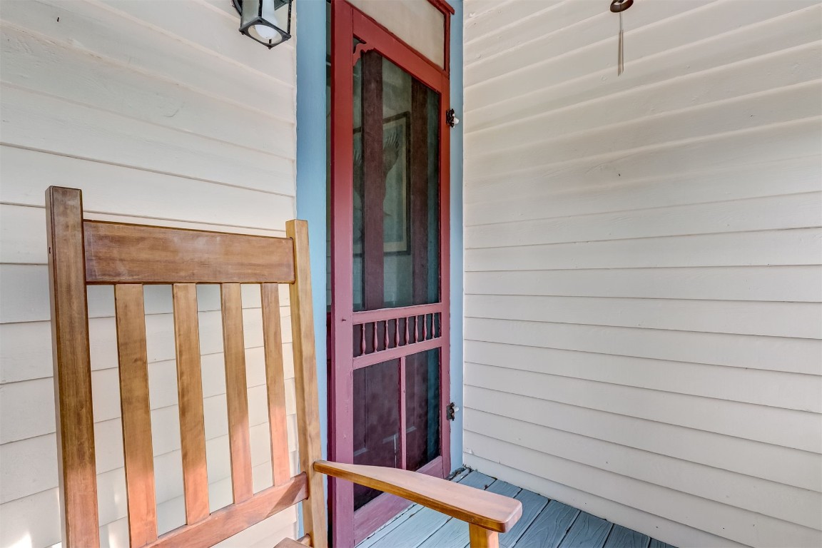 22 North 4th Street Fernandina Beach, FL 32034 - Photo 48 of 100 Enjoy the afternoon from your rocker on the 2nd floor porch.