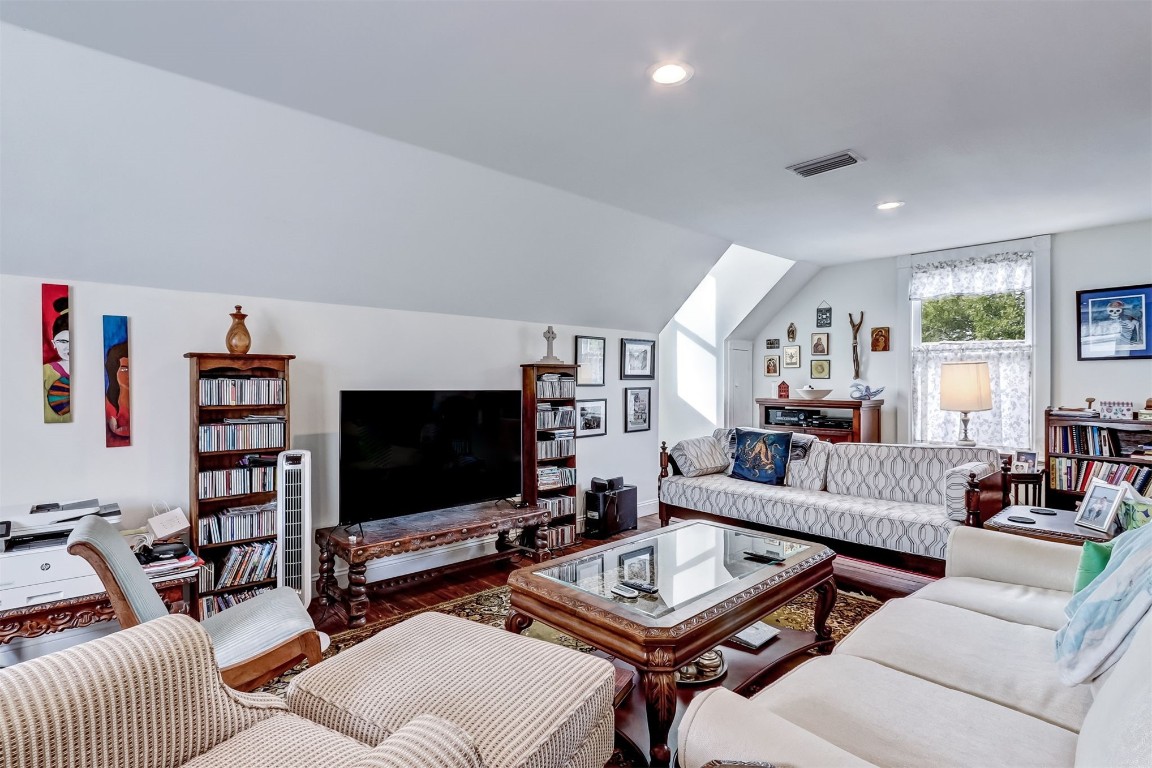 22 North 4th Street Fernandina Beach, FL 32034 - Photo 50 of 100 a living room with furniture and a flat screen tv