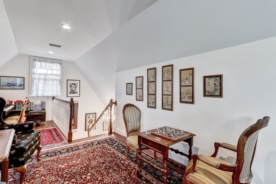 22 North 4th Street Fernandina Beach, FL 32034 - Photo 57 of 100 a living room with furniture a flat screen tv and a window