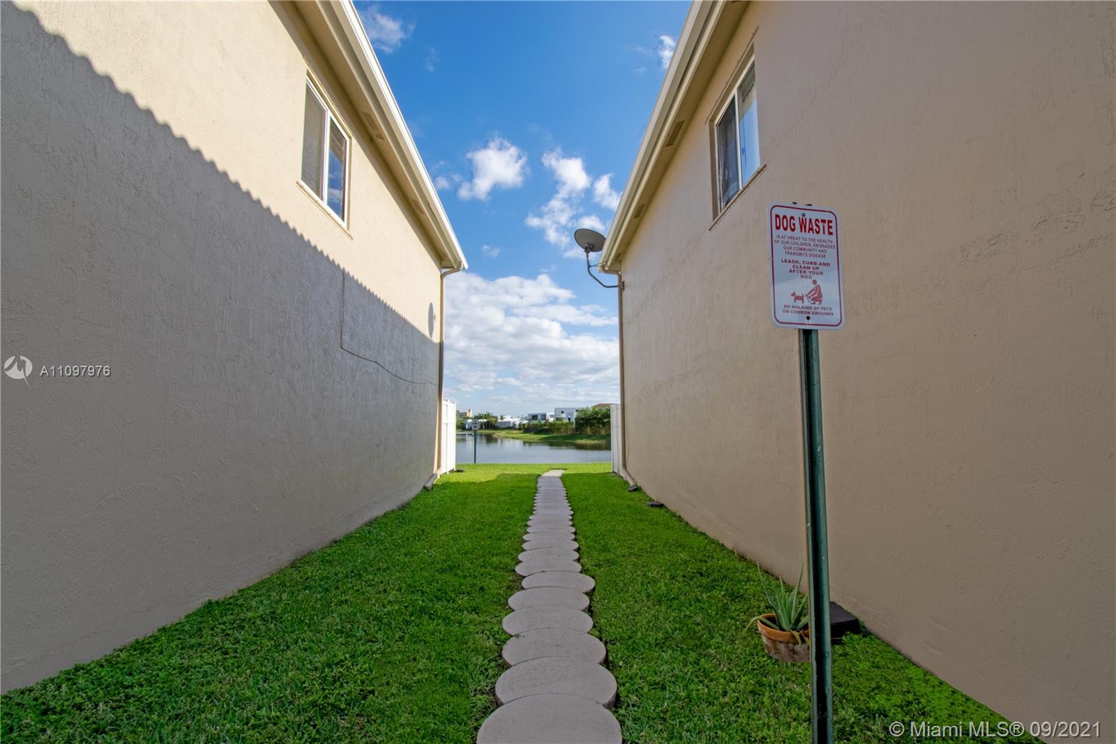 184 Riviera Circle, Unit 325 Weston, FL 33326 - Photo 18 of 27 a view of a pathway of a building
