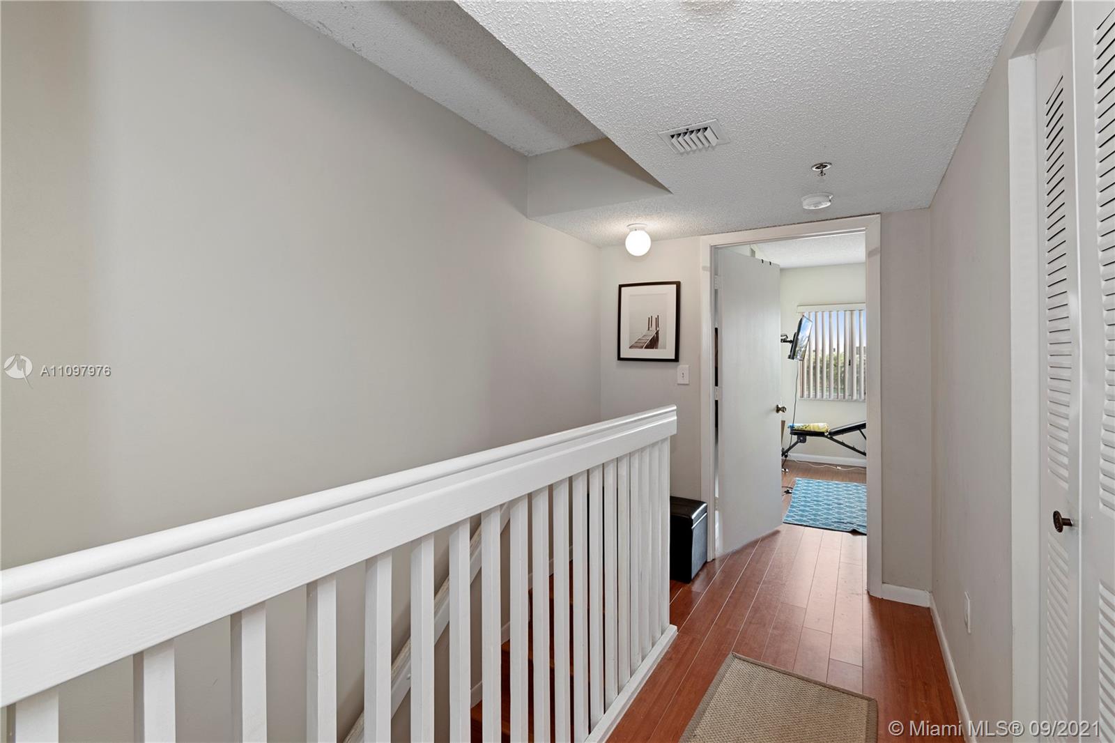 184 Riviera Circle, Unit 325 Weston, FL 33326 - Photo 10 of 27 a view of hallway with livingroom
