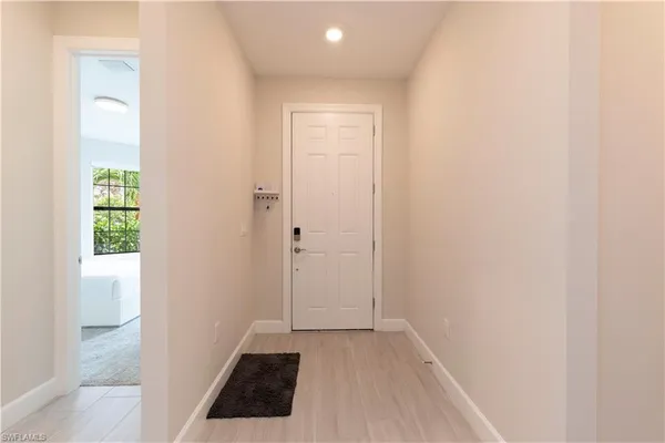 a view of bathroom with a sink and a shower