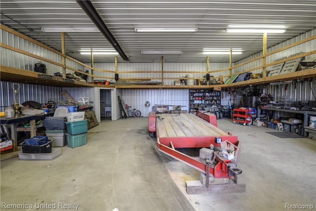 8830 South Rushton Road South Lyon, MI 48178 - Photo 38 of 48 Pole barn with loft-walkway and private bath.