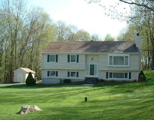 28 Codfish Hill Rd Extension Bethel, CT 06801 - Photo 1 of 1 a front view of a house with a garden