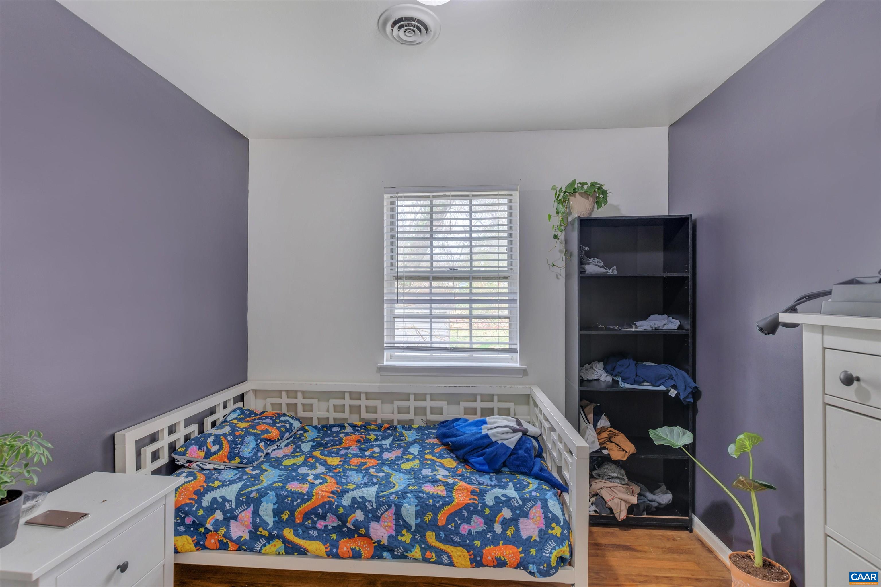 113 Summit Street, Unit 113 Charlottesville, VA 22903 - Photo 12 of 15 a bedroom with a bed and a window