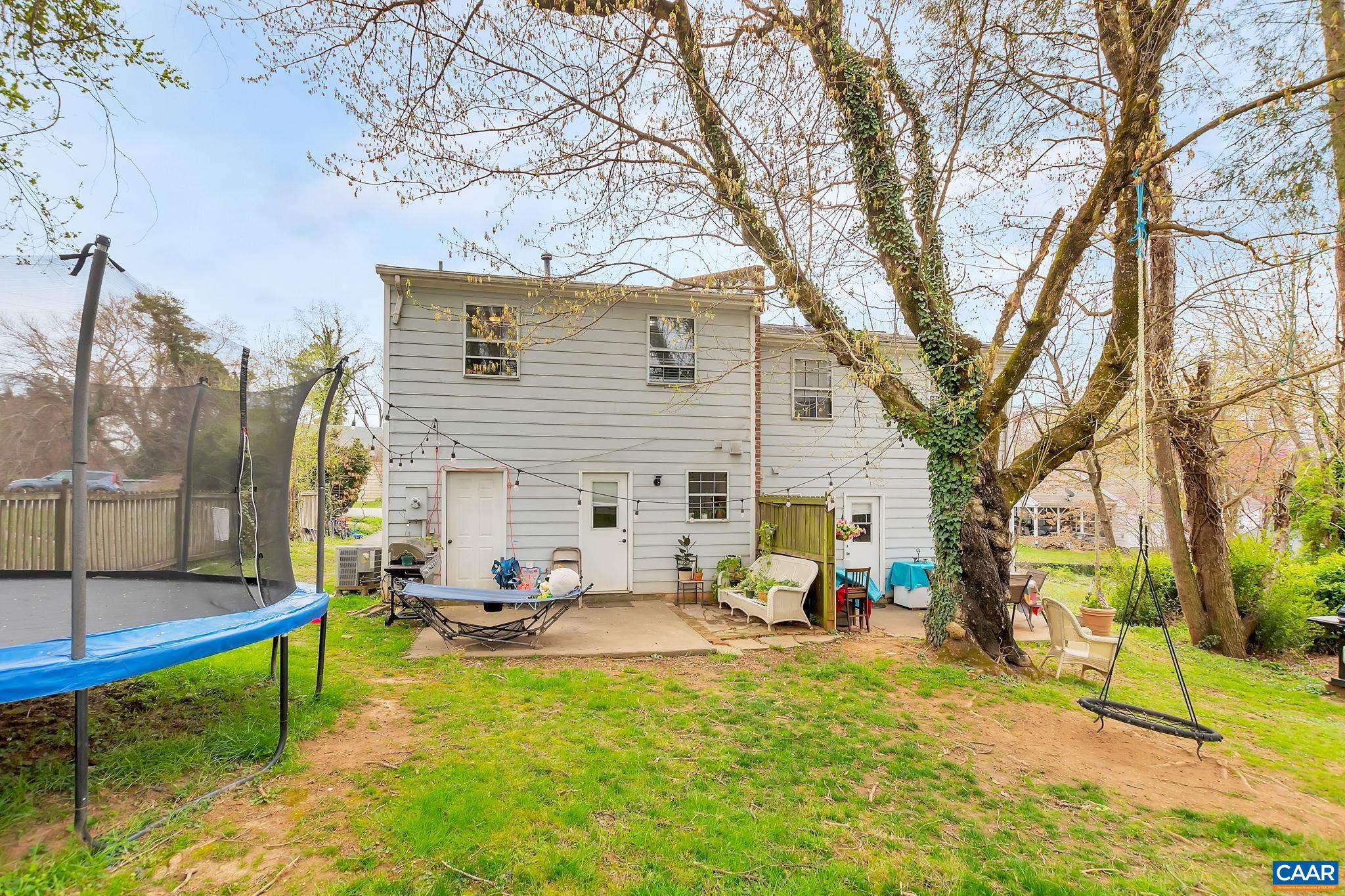 113 Summit Street, Unit 113 Charlottesville, VA 22903 - Photo 15 of 15 a view of a house with backyard and sitting area