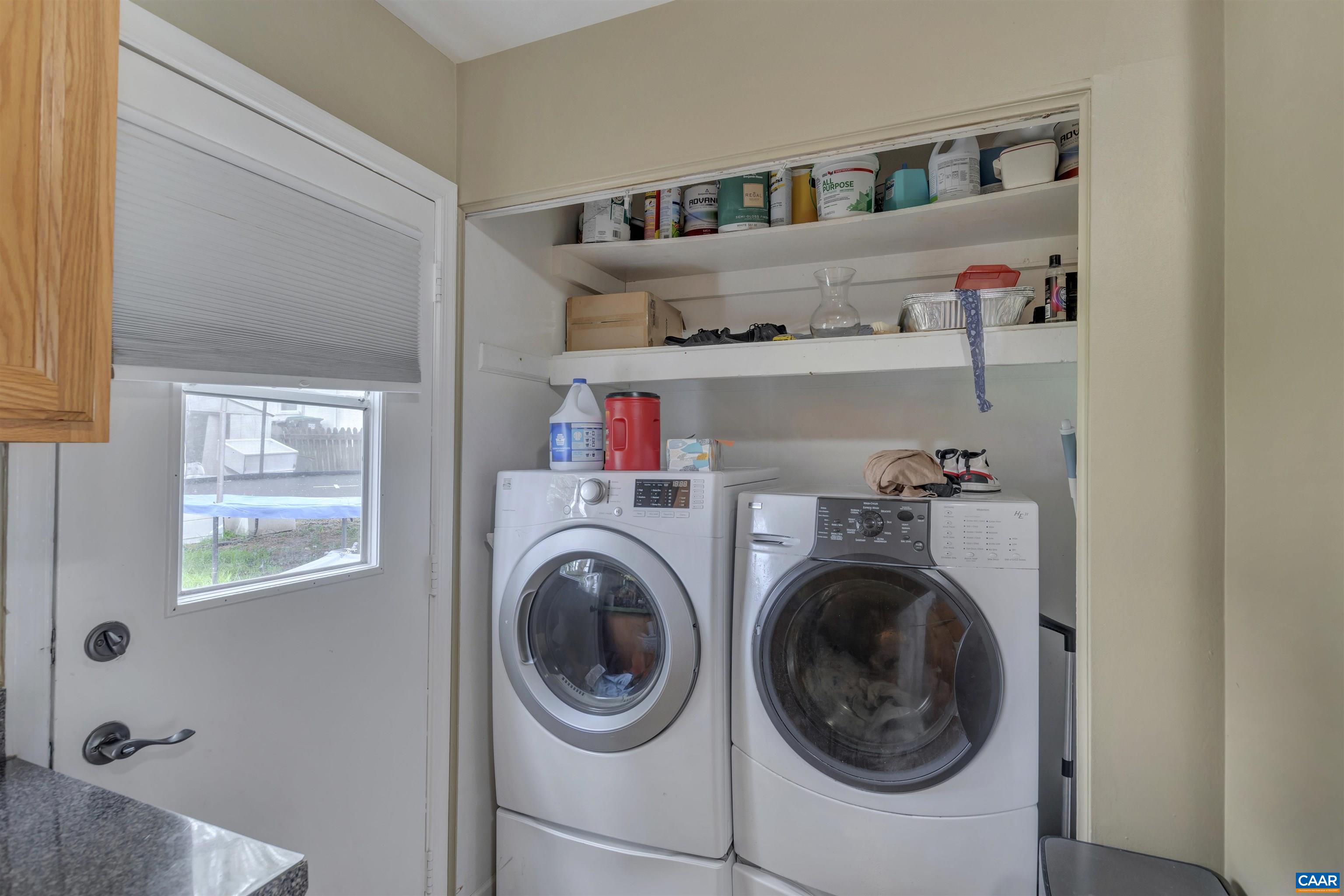 113 Summit Street, Unit 113 Charlottesville, VA 22903 - Photo 8 of 15 a view of storage and utility room with washer and dryer