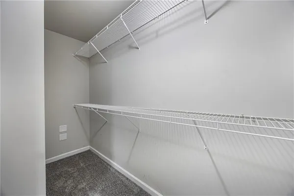 a view of a room with racks on the wall
