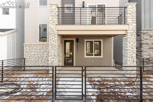 a view of a brick buildings with many windows