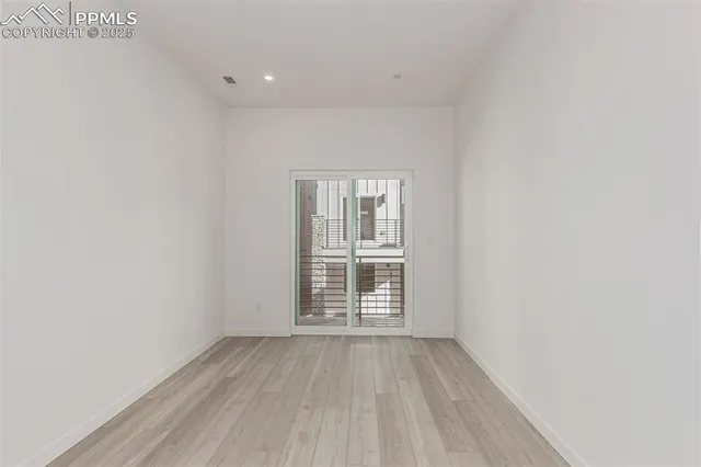 a view of a room with an empty space